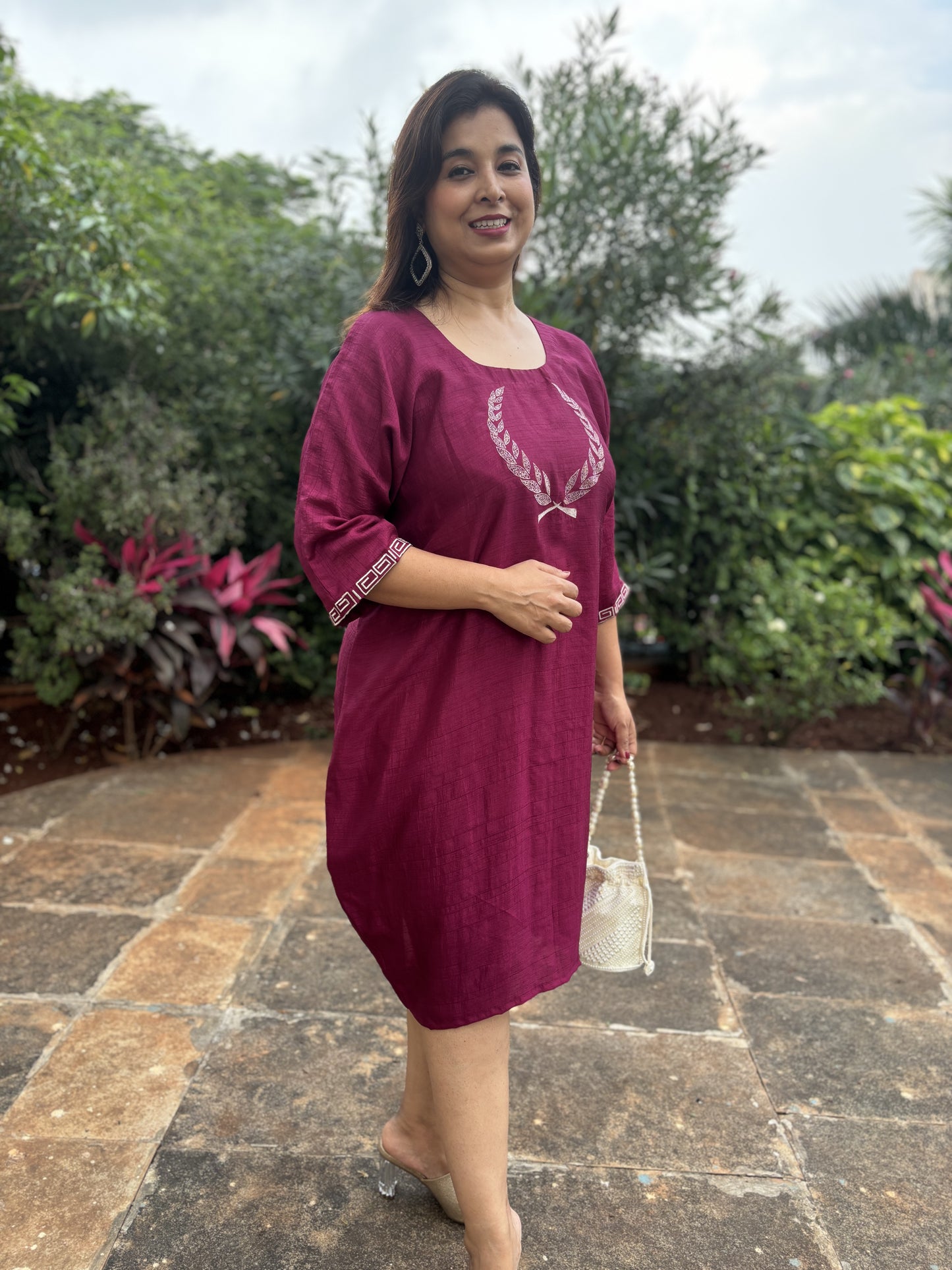 Embroidered Rome motif dress