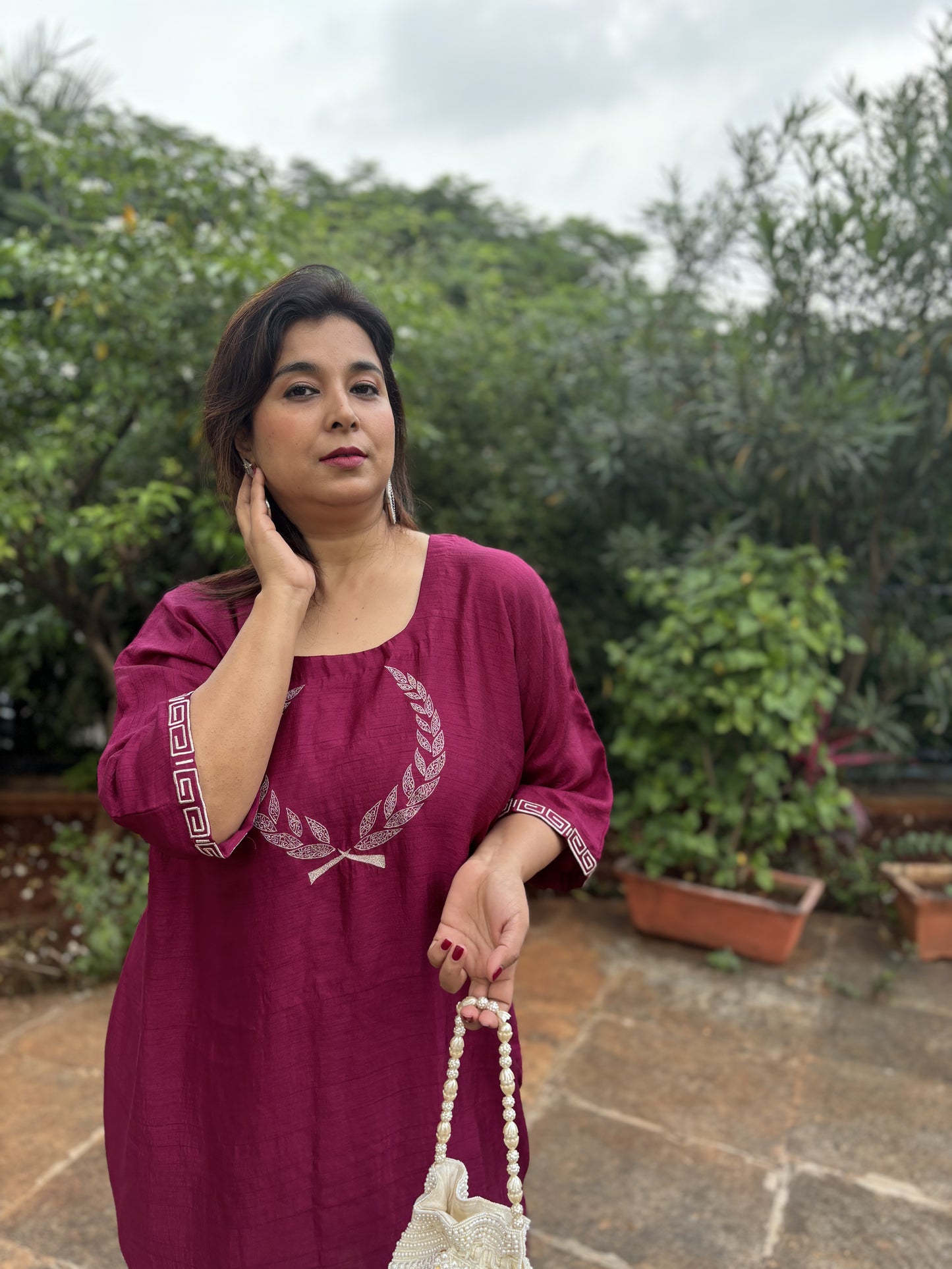 Embroidered Rome motif dress